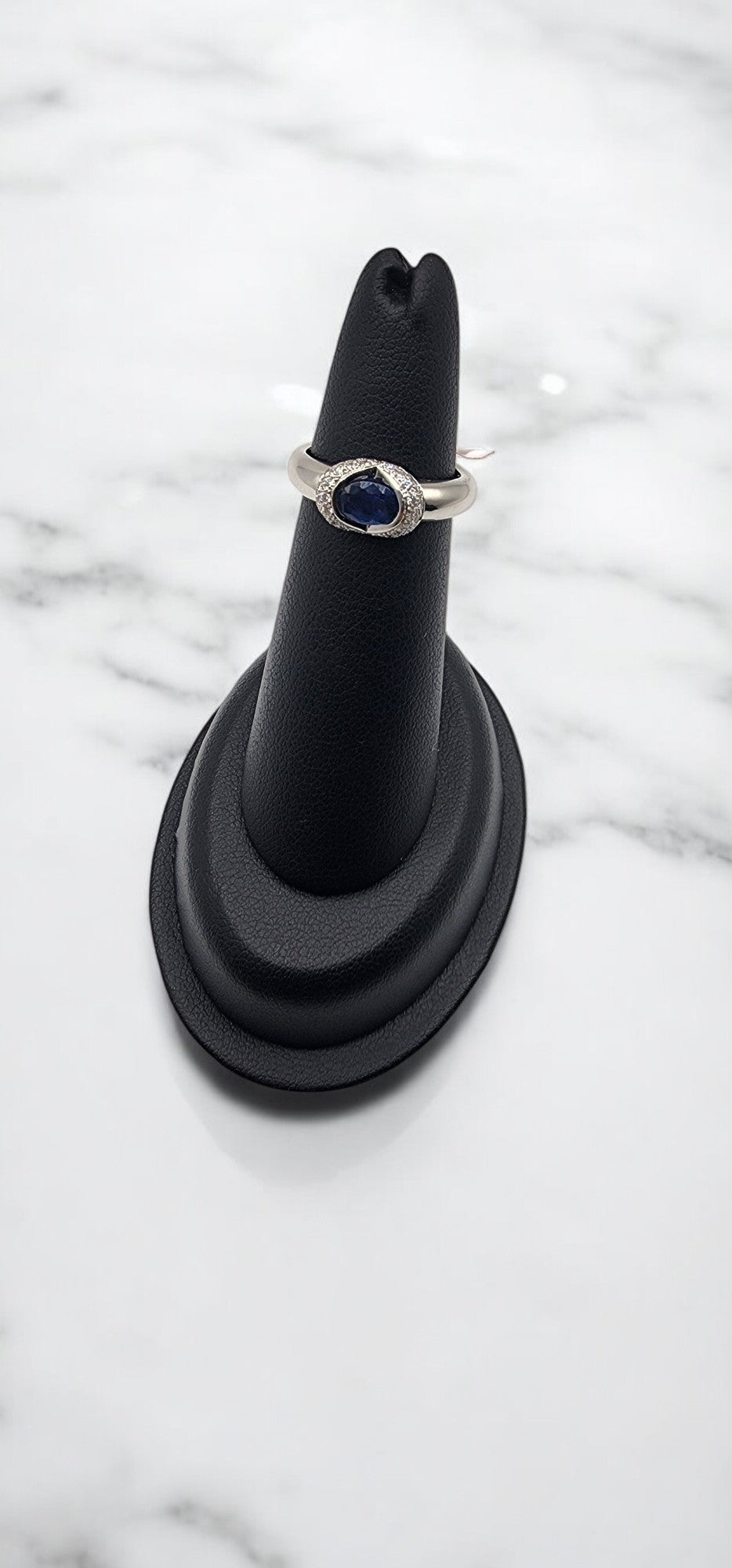 18KT White Gold .70cttw Oval Sapphire & .20cttw White Band Diamond Ring