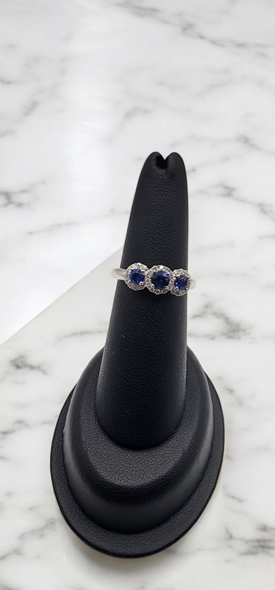 18KT White Gold .75cttw Sapphire & .20cttw White Diamond Halo Ring