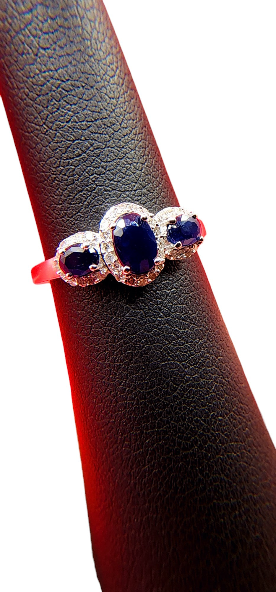 14KT White Gold Gen Oval Sapphire w/ .20 Diamond Ring